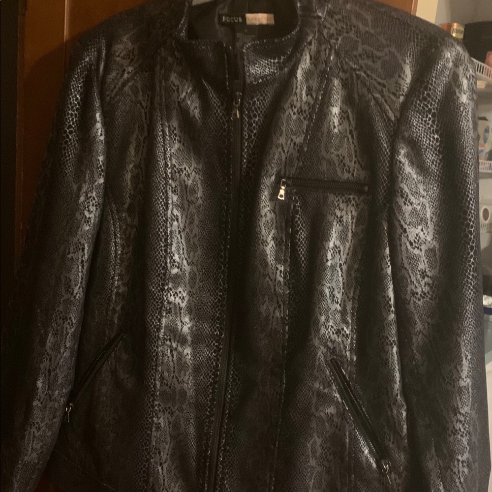 Waist length snake print jacket.